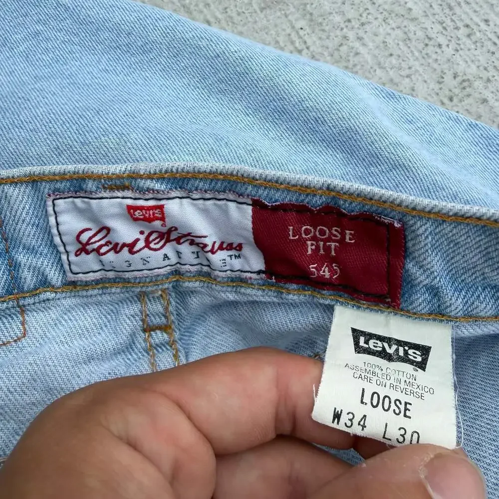 95 Vintage Levi's orange tab 545 Loose Fit Light Wash Denim Jeans W34 L30